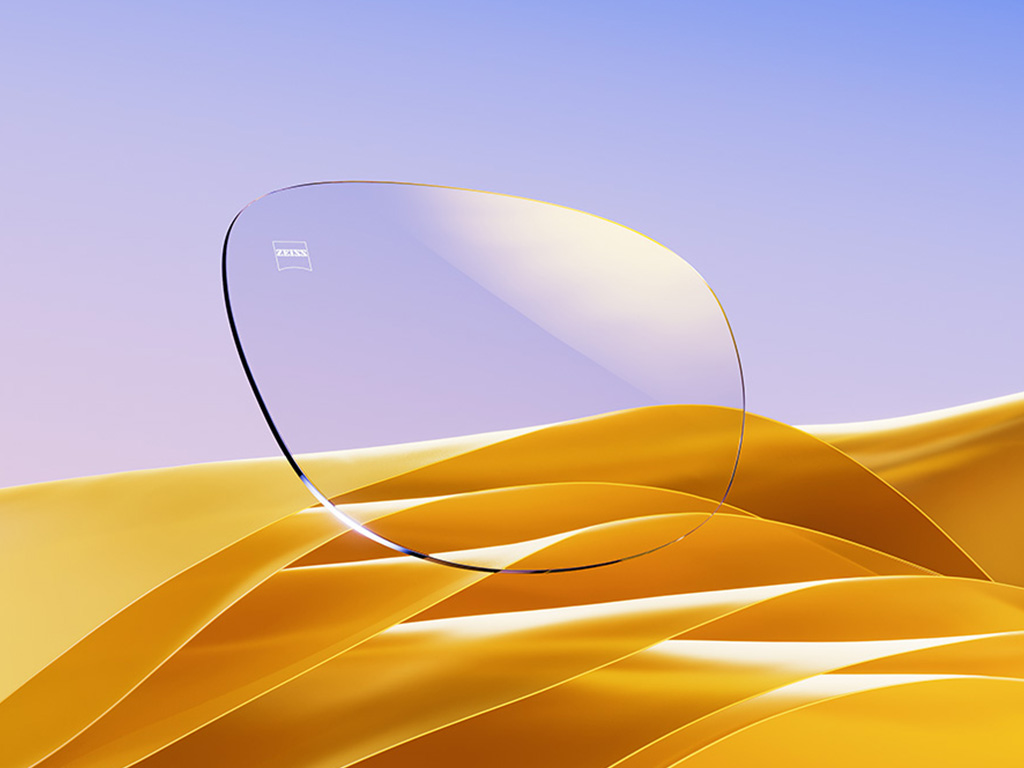 Représentation en images de synthèse d&apos;un verre blanc de lunettes avec un reflet légèrement doré.