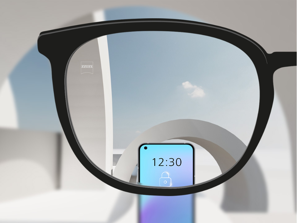 Illustration schématique du point de vue à travers un verre unifocal SmartLife Young qui montre une vue nette des objets distants et des appareils numériques. 